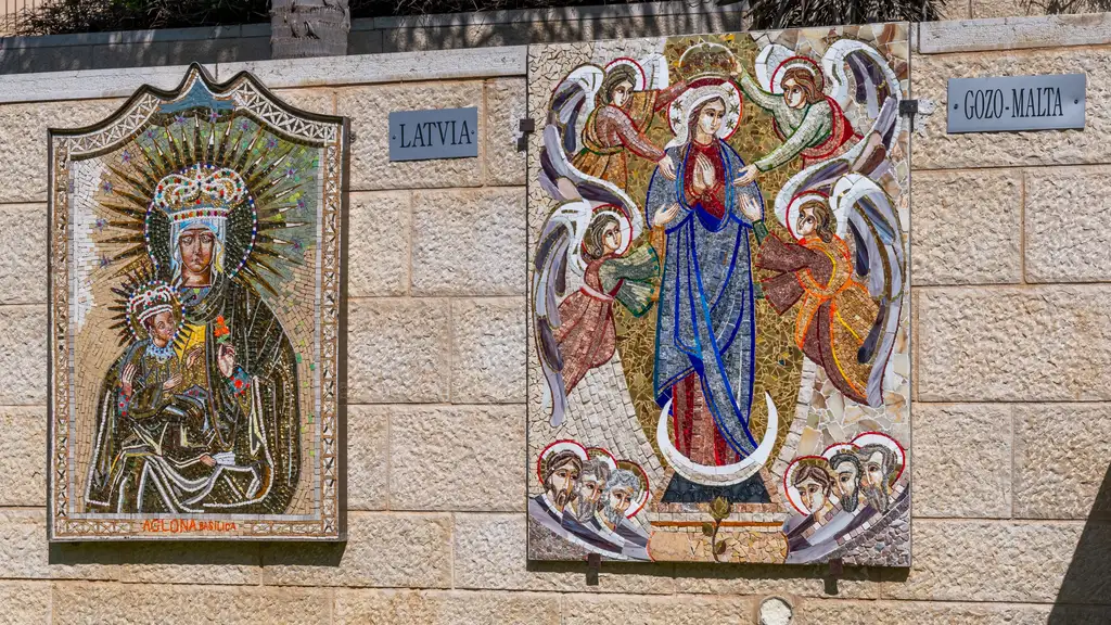 Marian mosaics donated by Latvia and Gozo-Malta on the basilica courtyard wall.